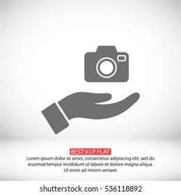 Camera in hand icon