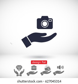 Camera in hand icon