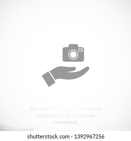 Camera in hand icon , lorem ipsum Flat design