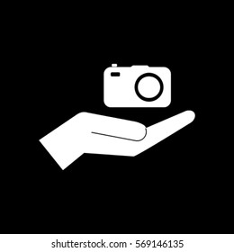 Camera in the hand icon, photo vector illustration