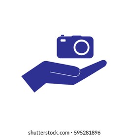 Camera in the hand icon, photo vector illustration