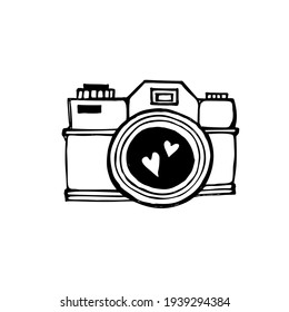 Camera with heart on lens. Vector illustration. Doodle drawing isolated on white background.