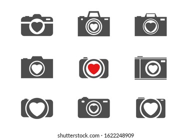 Camera with heart symbol. Love story and wedding concept