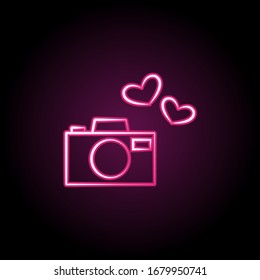 Camera with hearts neon icon. Simple thin line, outline vector of wedding icons for ui and ux, website or mobile application