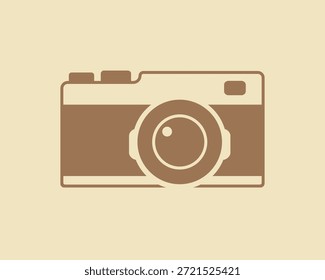 Icono de la cámara. Cámara marrón sobre un fondo beige. Imagen de una cámara para un estudio fotográfico, tarjeta de visita del fotógrafo o espacio de Fotografía
