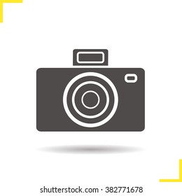 Camera icon. Drop shadow photo camera pictogram. Isolated black illustration. Logo concept. Vector silhouette icon