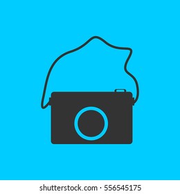 Camera icon flat. Simple vector black pictogram on blue background