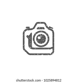 Camera icon in grunge texture. Vintage style vector illustration.