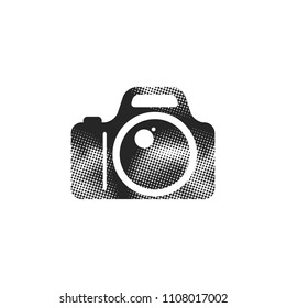 Camera icon in halftone style. Black and white monochrome vector illustration.