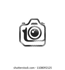 Camera icon in halftone style. Black and white monochrome vector illustration.