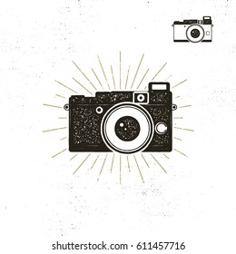 Camera icon, silhouette style. Old letterpress effect. Black pictogram isolated on white 