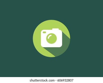 Camera Icon in trendy flat design style isolated on green background.
