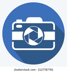 Camera I Icon in trendy long shadow style isolated on soft blue background