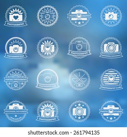 Camera icons or labels set - vector photography badges and logos on blurred sky background