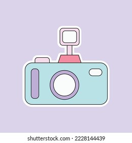 a camera isolated on soft purple background 