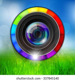 Camera Lens with Color Wheel over Beautiful Background