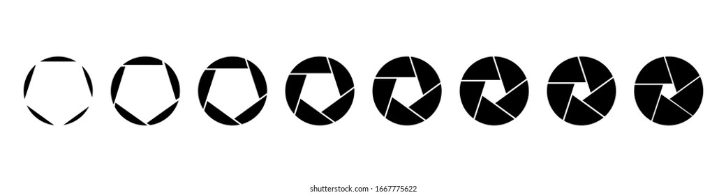 Camera lens diaphragm row with various aperture values.