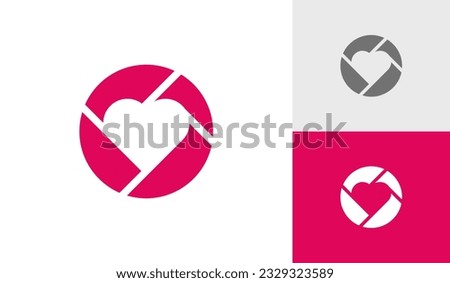 Camera lens with heart logo design