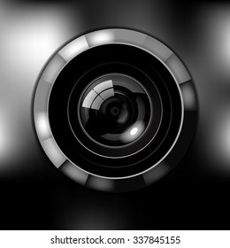 Camera Lens Isolated on Blurry and Desaturated Background