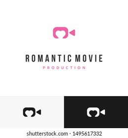 A camera logo with heart symbol inside in negative space logo design inspiration. Suitable for wedding movie business