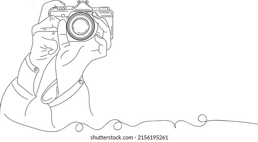 Camera logo, Photography logo, Outline sketch drawing of hand holding still camera, line art vector illustration of photography camera