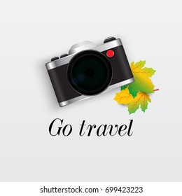 Camera and mapel leaf ,concept travel and tourism and  Preparing for your journey. Outfit of modern traveler Top view