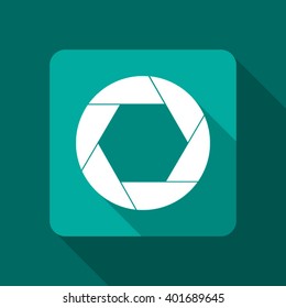 Camera objective icon on green background with shadows, vector illustration