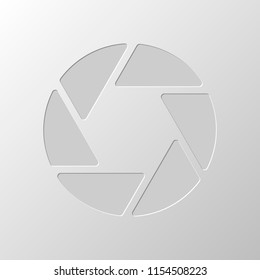 camera objective. simple silhouette. Paper design. Cutted symbol. Pitted style