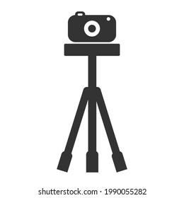 camera on tripod vector icon. 