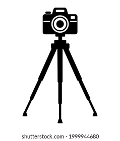 camera on a tripod on a white background