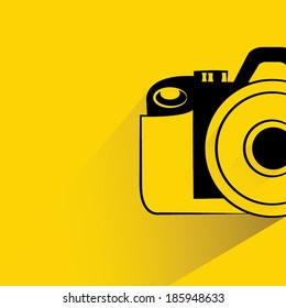camera on yellow background, flat and shadow theme