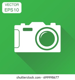 Camera photographer icon. Business concept photography camera pictogram. Vector illustration on green background with long shadow.