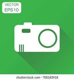 Camera photographer icon. Business concept photography camera pictogram. Vector illustration on green background with long shadow.