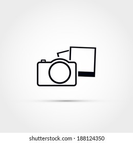 Camera with photographs icon
