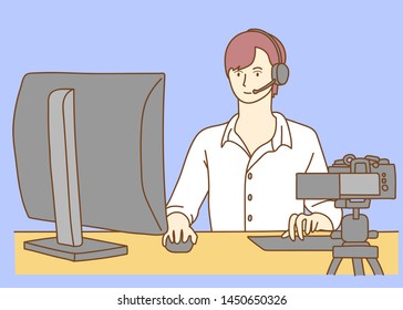 Camera recording a young female blogger playing game while making a video