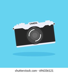 Camera of retro or vintage  in a flat style on a colored background.