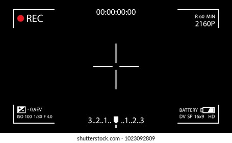 Camera screen with white frame, figures and battery symbol. Camcorder viewfinder on black background.