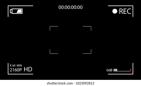 Camera screen with white frame, figures and battery symbol. Camcorder viewfinder on black background.