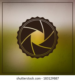 Camera shutter icon on blurry background.Vector illustration