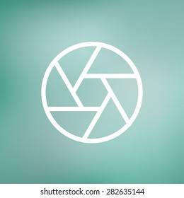 Camera shutter icon thin line for web and mobile, modern minimalistic flat design. Vector white icon on gradient mesh background.