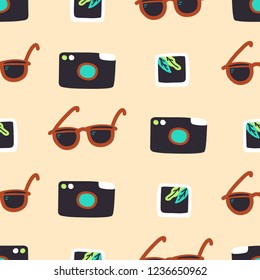 Camera, snapshot and sunglasses seamless vector pattern. Print for traveler or photographer