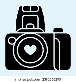Camera solid icon. Romantic photocamera with heart. Wedding asset vector design concept, glyph style pictogram on white background, use for web and app. Eps 10