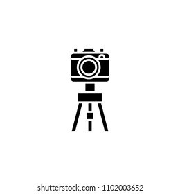 Camera with the tripod black icon concept. Camera with the tripod flat  vector symbol, sign, illustration.