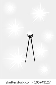 Camera With A Tripod And Flash Isolated On Gray Background