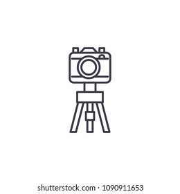 Camera with the tripod linear icon concept. Camera with the tripod line vector sign, symbol, illustration.