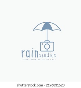 Camera with umbrella, creative ideas of photography studio logo design concept