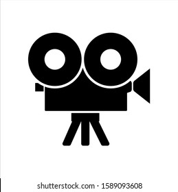 Camera vector icon. Cinema instrument on isolated background.