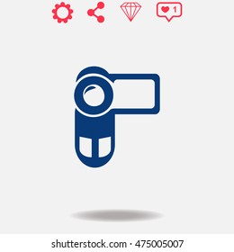 Camera vector icon on grey background.