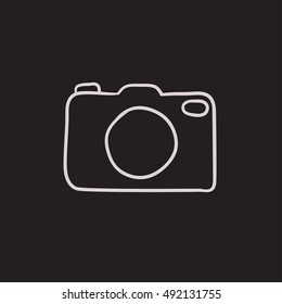 Camera vector sketch icon isolated on background. Hand drawn Camera icon. Camera sketch icon for infographic, website or app.