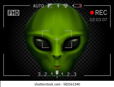 Camera viewfinder rec green alien face with black eyes on transparent dark background. Record video with stranger. Invader head. UFO theme
